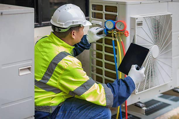 Professional Hvac technician working in Wellesley, MA